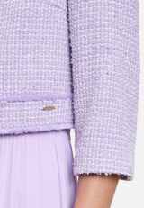Bolero-Jacke mit aufgesetzten Taschen / Detailbild