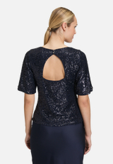 Pailletten-Bluse mit Flügelärmeln / Modellfoto Rückseite
