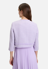 Bolero-Jacke mit aufgesetzten Taschen / Modellfoto Rückseite
