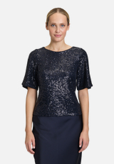 Pailletten-Bluse mit Flügelärmeln / Modellfoto Vorderseite