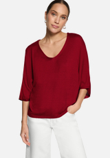 Kurzarmpullover  mit V-Ausschnitt / Modellfoto Vorderseite