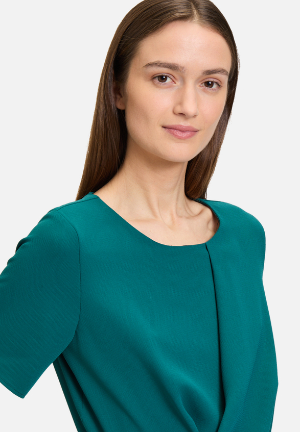 Jumpsuit mit Bindegürtel / Detailbild