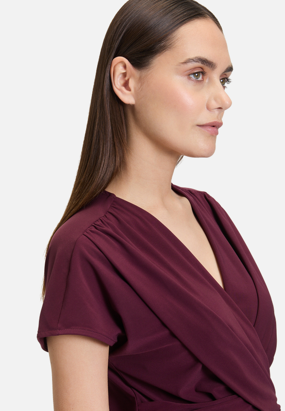 Jerseykleid mit Raffung / Detailbild