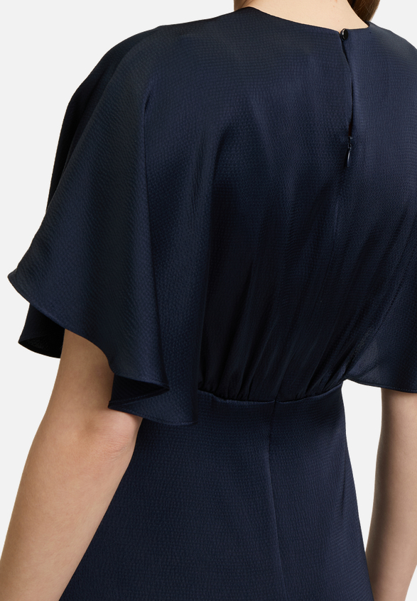Cocktailkleid mit ausgestelltem Rock / Detailbild