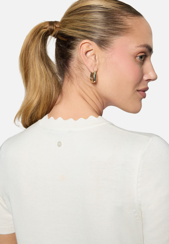 Kurzarmpullover  mit Wellensaum  / Detailbild