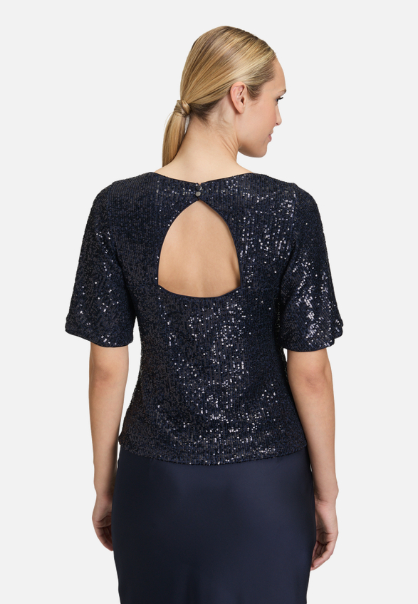 Pailletten-Bluse mit Flügelärmeln / Modellfoto Rückseite