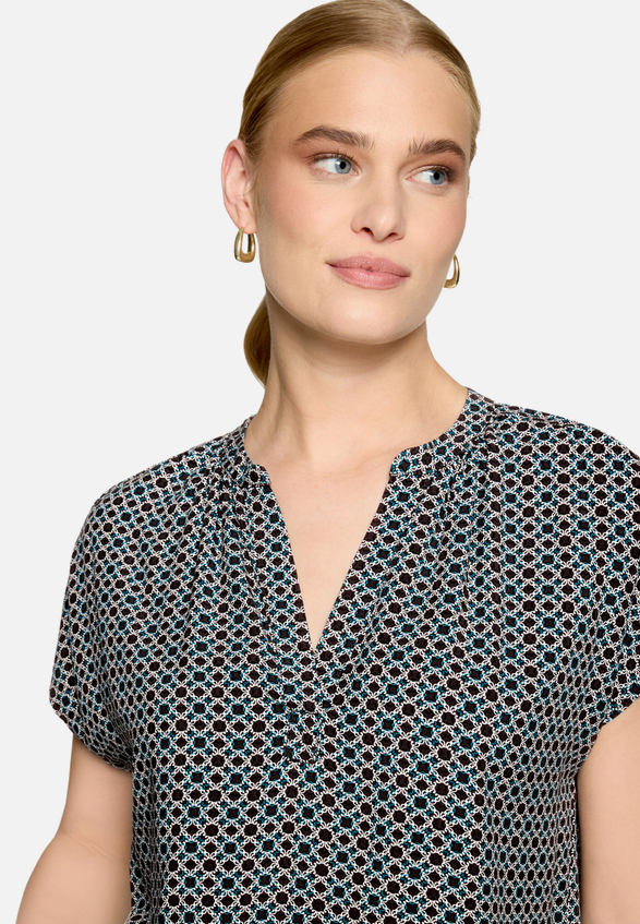 Blusenshirt  mit grafischem Muster  / Detailbild