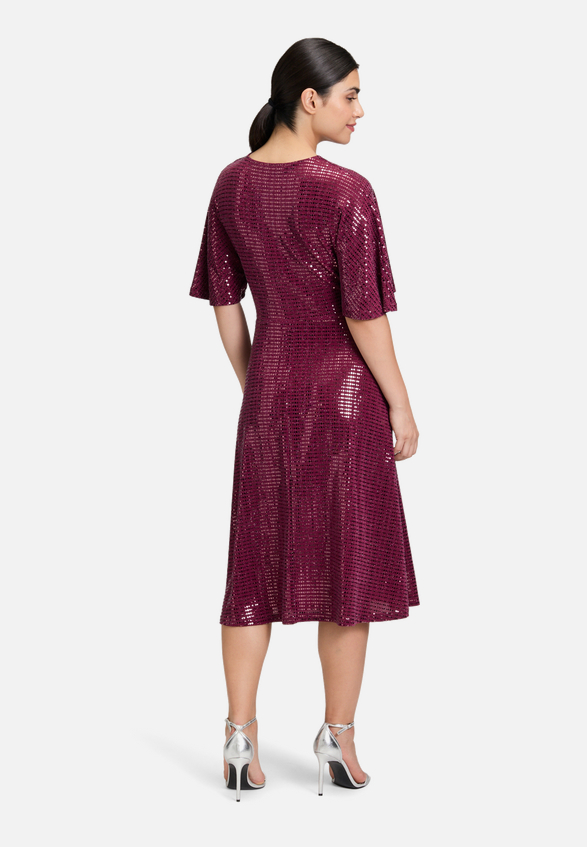 Cocktailkleid im Glitzer-Look / Modellfoto Rückseite