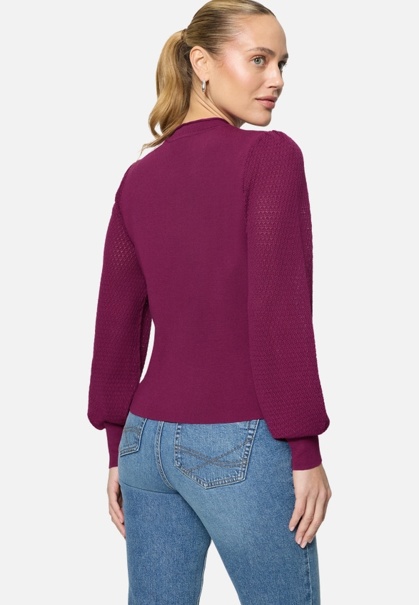 Feinstrickpullover  mit Puffärmeln  / Modellfoto Rückseite