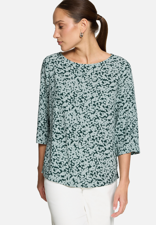 Blusenshirt mit Blumenmuster / Modellfoto Vorderseite