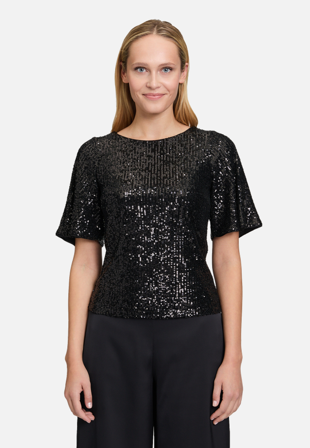 Pailletten-Bluse mit Flügelärmeln / Modellfoto Vorderseite